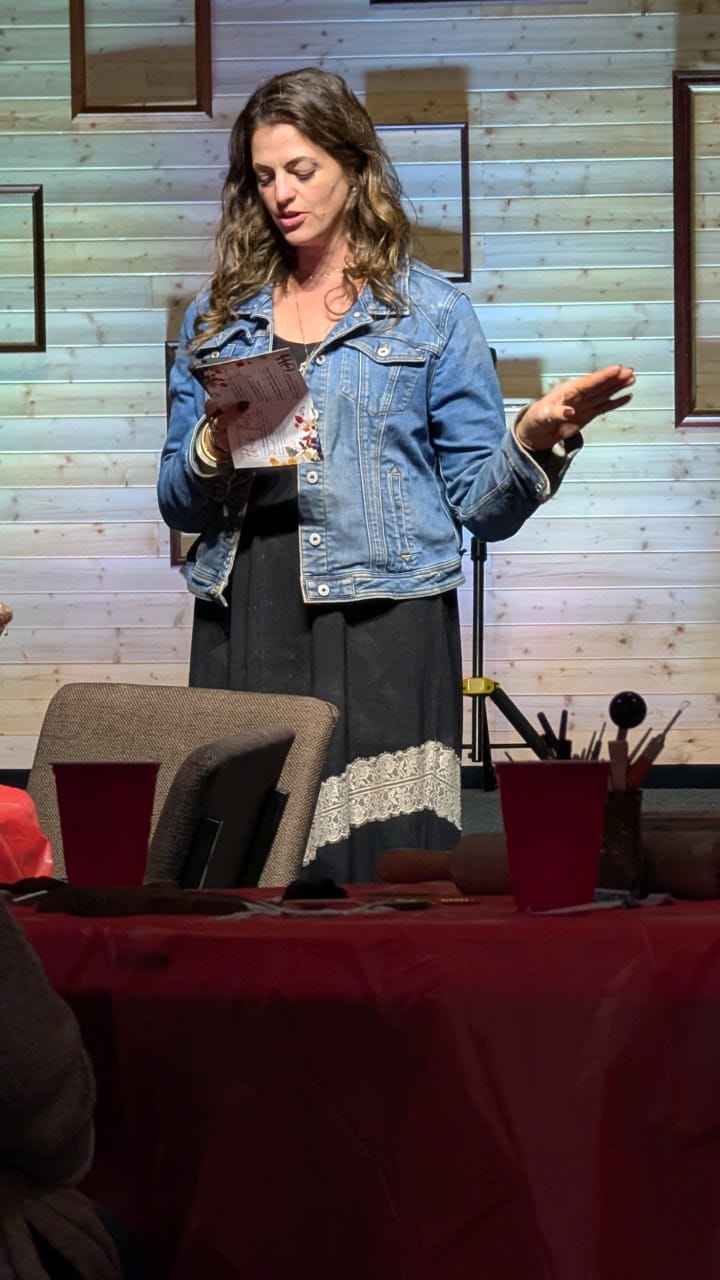 April Dupuis demonstrating a hand-building technique